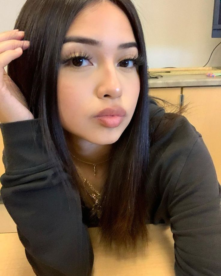 Selfie of a young woman with long dark hair