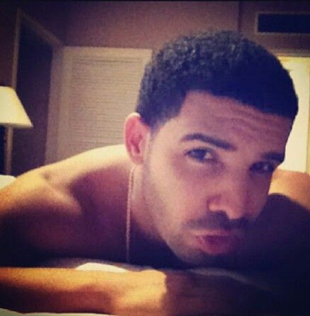 Selfie of Drake lying down, looking at the camera