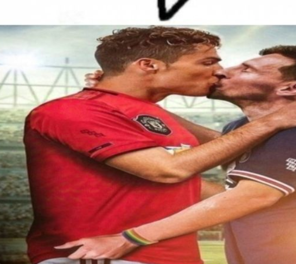 Two soccer players in an intimate embrace, one in red jersey