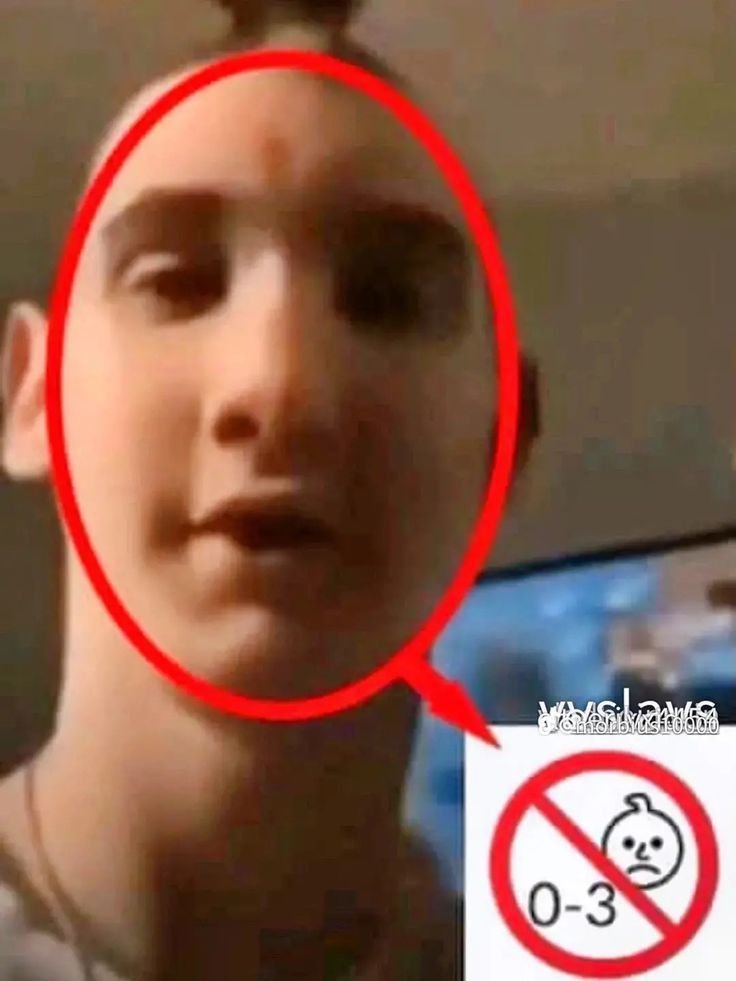 Close-up of person's face with red circle and age restriction symbol