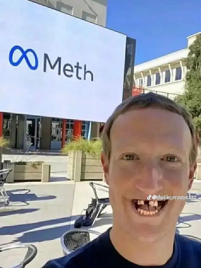 Mark Zuckerberg with altered smile in front of Meta building